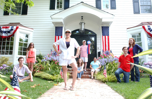 Posed in front of PAPA's Fourth of July home-decorating contest winner are (left to right) Nick Mercer, Ari Olswanger, Vicki Mercer (front), Molly and Jim Mercer, Maria Moranda, Jorge Fernandez and Katie Mercer.